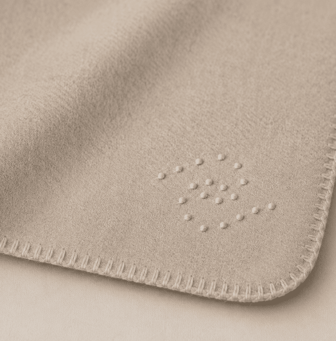 Cashmere blanket with twenty embroidered marks